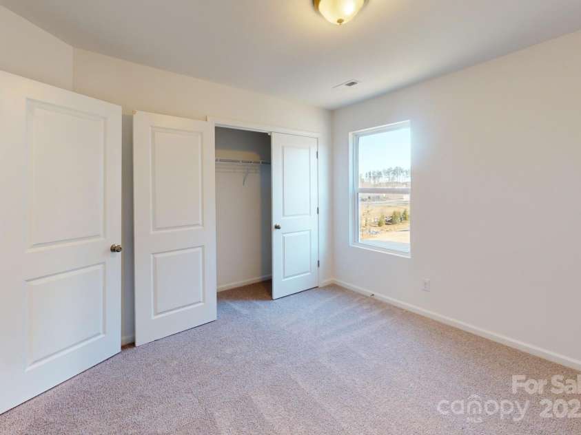 1817 Augustine Street, Monroe, NC 28112.  MLS# CAR4255317, YatesRealty ID 20460. Secondary bedroom