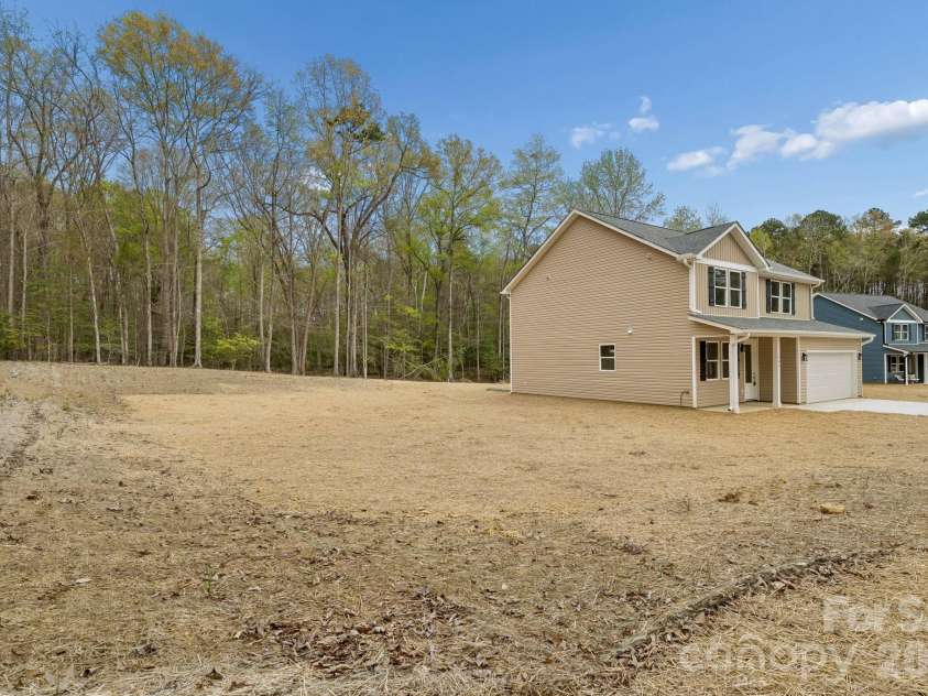 305 Mainsail Road, Salisbury, NC 28146.  MLS# CAR4343116, YatesRealty ID 20465. Side Yard