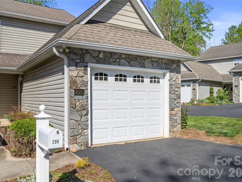 206 Waters Edge Drive, Weaverville, NC 28787.  MLS# CAR4359205, YatesRealty ID 20466. Single car garage
