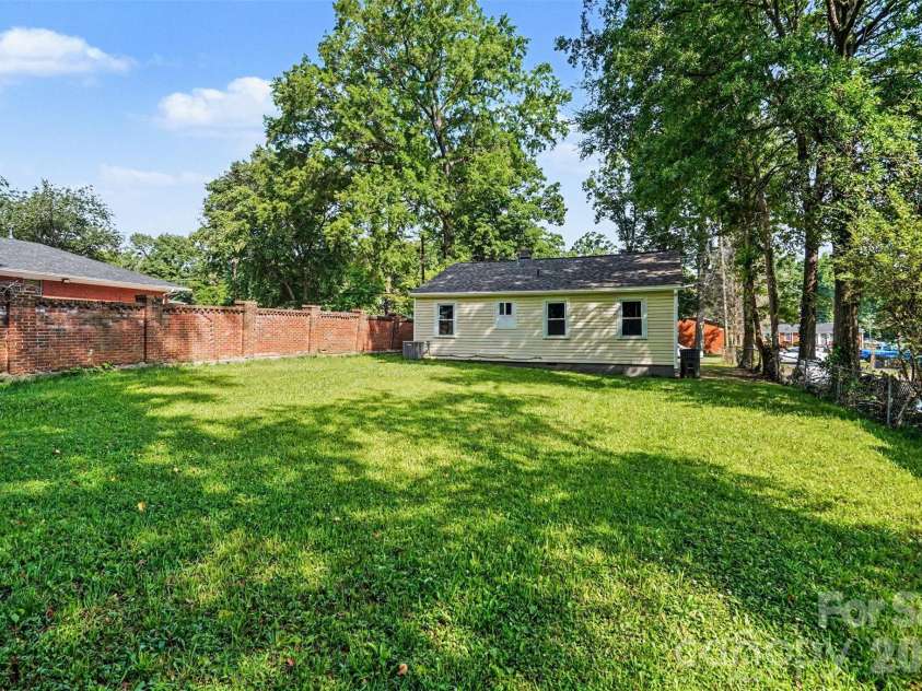 3628 Michigan Avenue, Charlotte, NC 28215.  MLS# CAR4391242, YatesRealty ID 20472. Level backyard