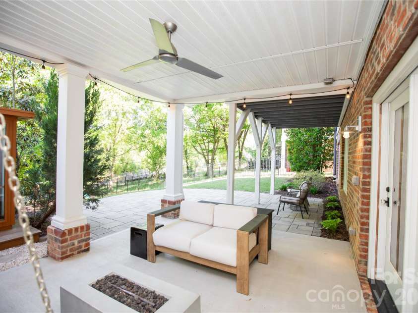 624 James Alexander Way, Davidson, NC 28036.  MLS# CAR4378174, YatesRealty ID 20473. Patio off 2nd living quarters - Basement Level