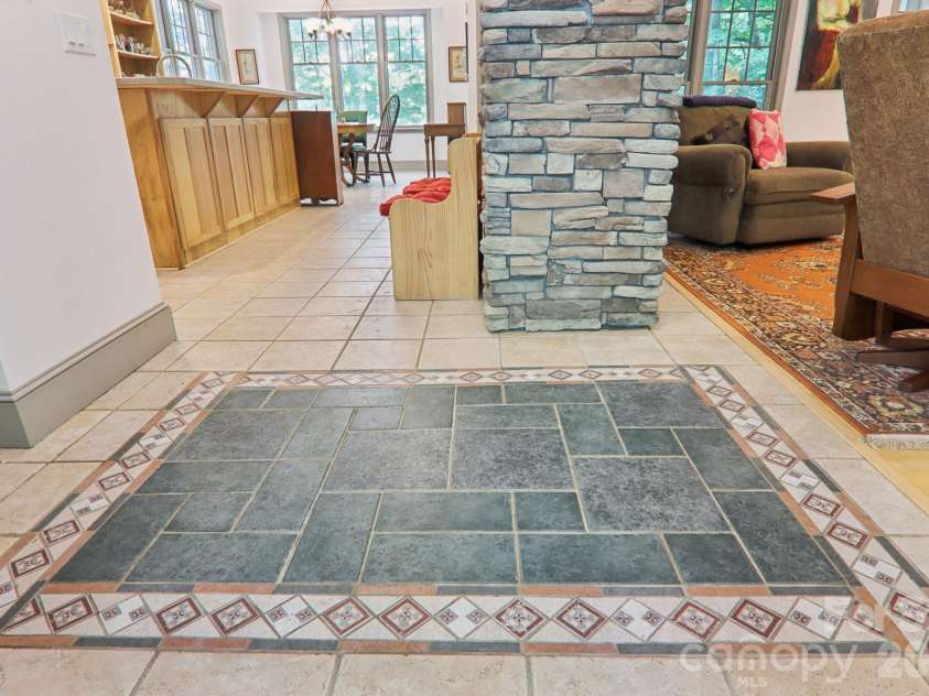 1063 Swiss Pine Lake Drive, Spruce Pine, NC 28777.  MLS# CAR4366630, YatesRealty ID 20477. Custom tile work at entry