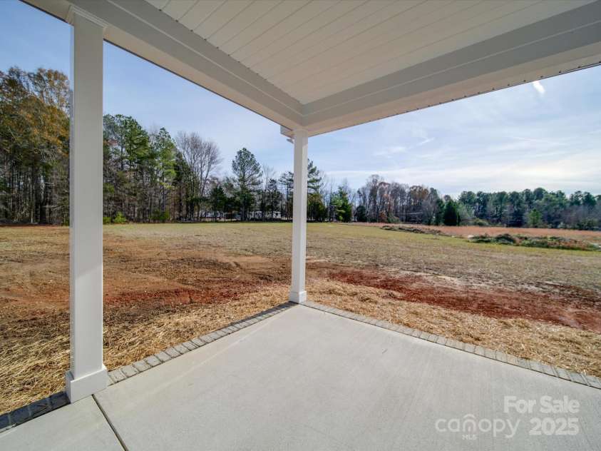 2335 Emanuel Church Road, Rockwell, NC 28138.  MLS# CAR4202927, YatesRealty ID 20479. Back Patio