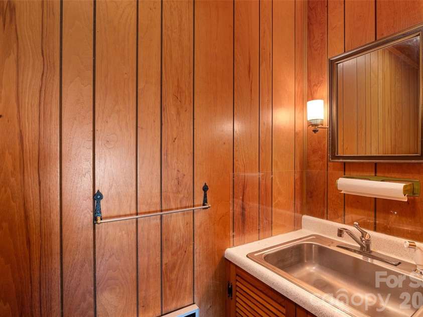 591 Landrum Road, Columbus, NC 28722.  MLS# CAR4337351, YatesRealty ID 20484. Half bath off mud/laundry room