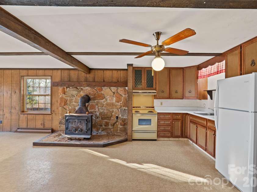 591 Landrum Road, Columbus, NC 28722.  MLS# CAR4337351, YatesRealty ID 20484. View from Stairs to kitchen