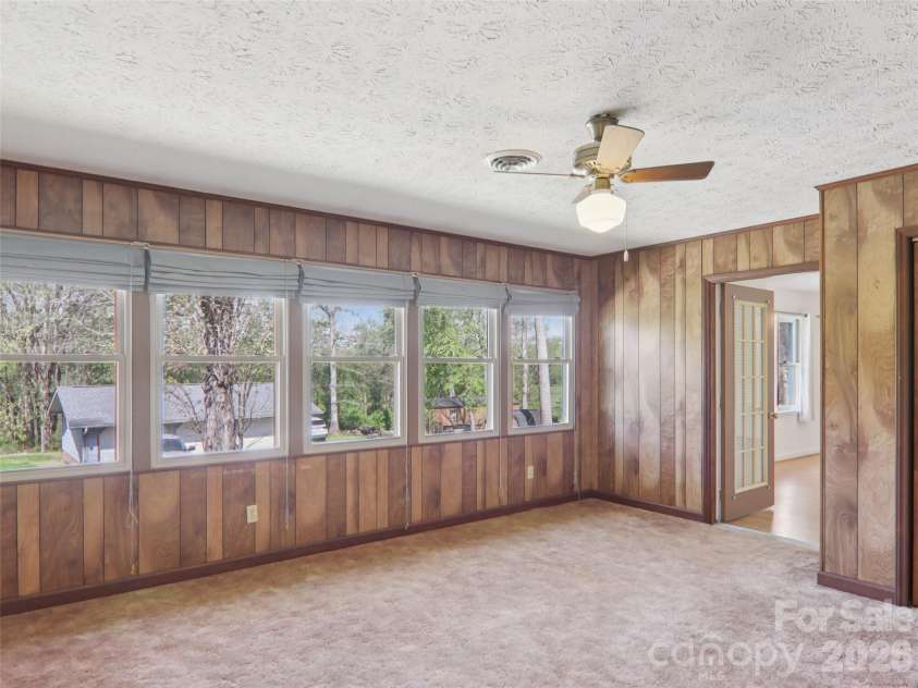 927 Ladson Road, Mills River, NC 28759.  MLS# CAR4370799, YatesRealty ID 20487. Flex space off the main bedroom