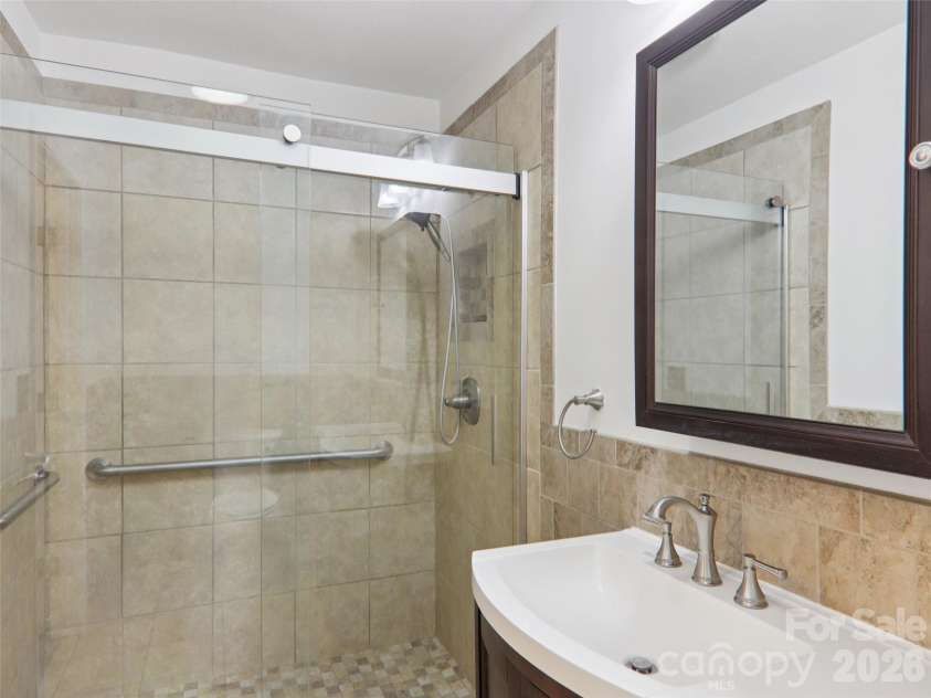 927 Ladson Road, Mills River, NC 28759.  MLS# CAR4370799, YatesRealty ID 20487. Full bath with walk in shower