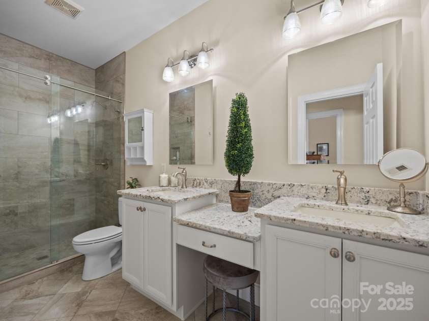 1011 Columbine Road, Asheville, NC 28803.  MLS# CAR4231603, YatesRealty ID 2049. Another fully upgraded bathroom upstairs provides ample space for everyone to get ready in style