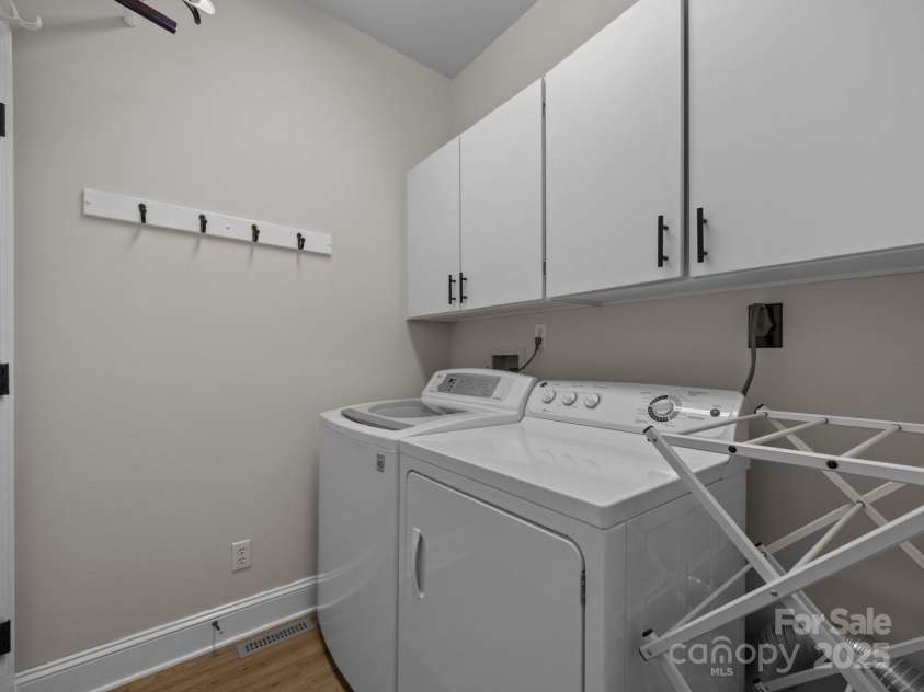1011 Columbine Road, Asheville, NC 28803.  MLS# CAR4231603, YatesRealty ID 2049. Laundry room is located on the main level