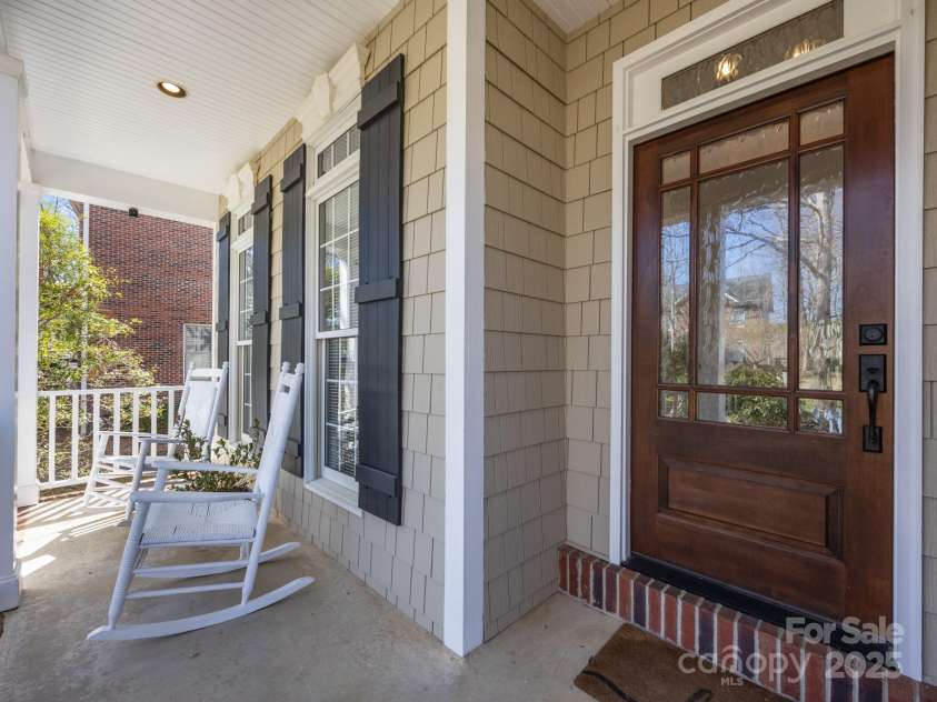 1011 Columbine Road, Asheville, NC 28803.  MLS# CAR4231603, YatesRealty ID 2049. Relax on the front porch with your morning coffee