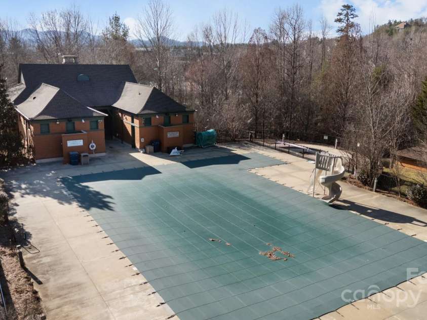 1011 Columbine Road, Asheville, NC 28803.  MLS# CAR4231603, YatesRealty ID 2049. Residents of Biltmore Park can enjoy the community pool and clubhouse with kitchen, tables/chairs, and restroom facilities at no additional charge
