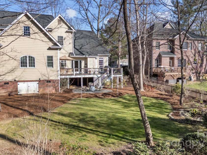 1011 Columbine Road, Asheville, NC 28803.  MLS# CAR4231603, YatesRealty ID 2049. The backyard is spacious and is a great space for dogs to run and play