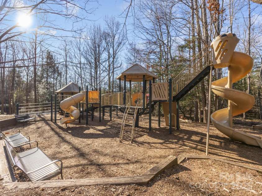 1011 Columbine Road, Asheville, NC 28803.  MLS# CAR4231603, YatesRealty ID 2049. The community playground is located near the pool and clubhouse