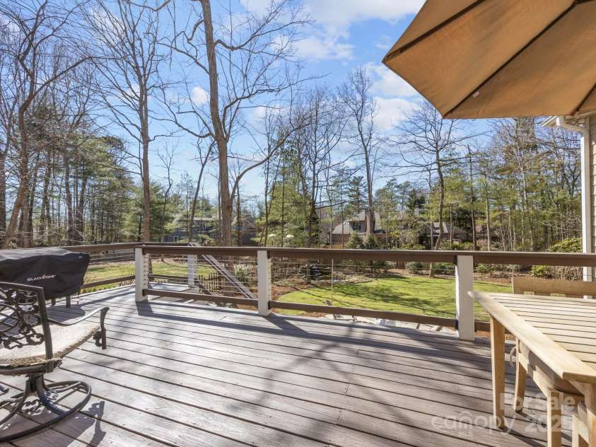 1011 Columbine Road, Asheville, NC 28803.  MLS# CAR4231603, YatesRealty ID 2049. The expansive back deck is perfect for grilling out