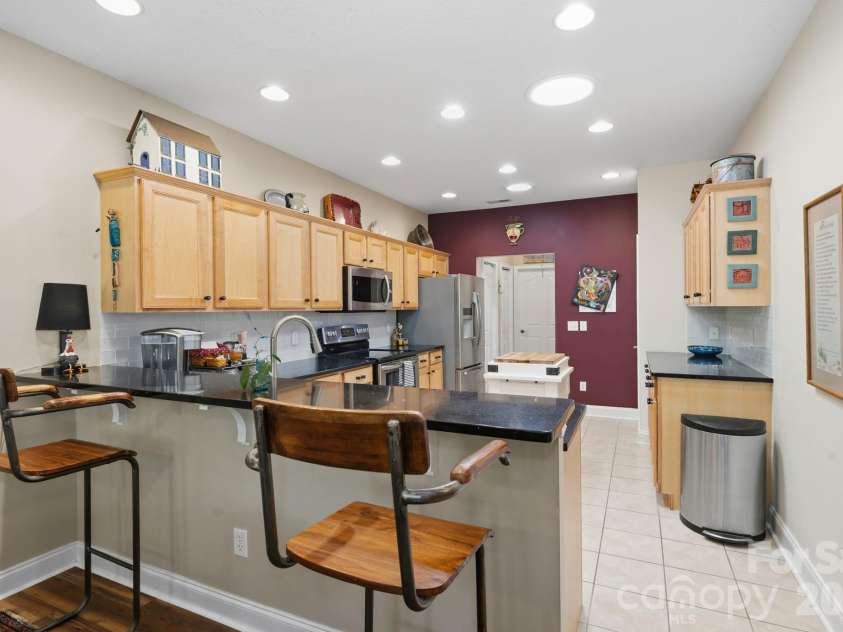 57 Outlook Circle, Swannanoa, NC 28778.  MLS# CAR4375791, YatesRealty ID 20493. Breakfast bar provides more relaxed seating for a quick bite