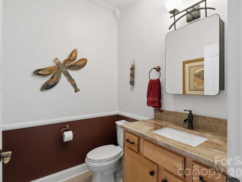 57 Outlook Circle, Swannanoa, NC 28778.  MLS# CAR4375791, YatesRealty ID 20493. Half bath on main has beautiful vanity with quartzite countertops