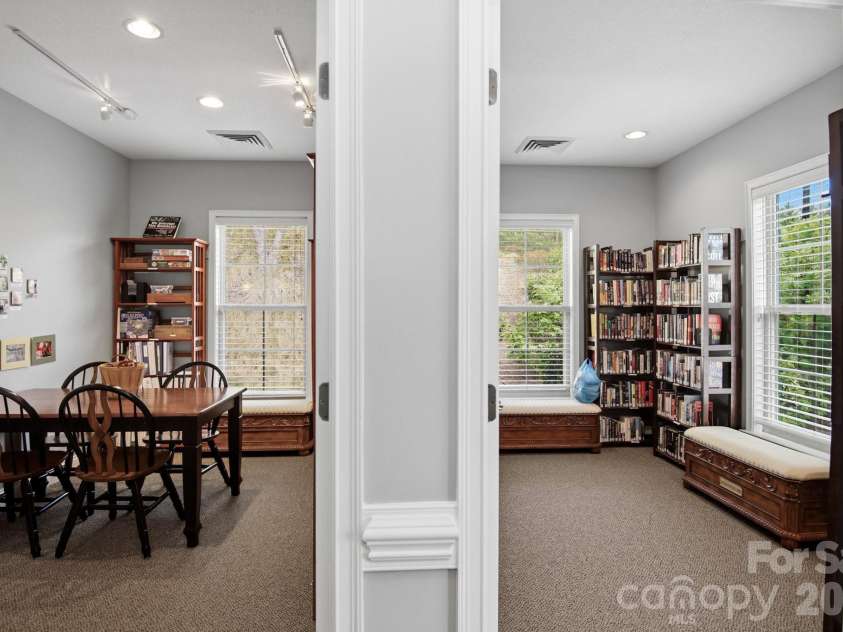 57 Outlook Circle, Swannanoa, NC 28778.  MLS# CAR4375791, YatesRealty ID 20493. Impressively stocked library