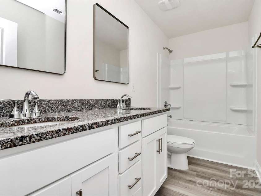 2822 Woodlands Creek Drive, Monroe, NC 28110.  MLS# CAR4237447, YatesRealty ID 20498. Guest Bathroom