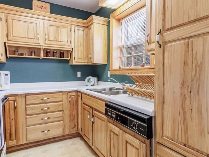 97 Covered Bridge Road, Stecoah, NC 98771.  MLS# CAR4377921, YatesRealty ID 20498. Downstairs Kitchen