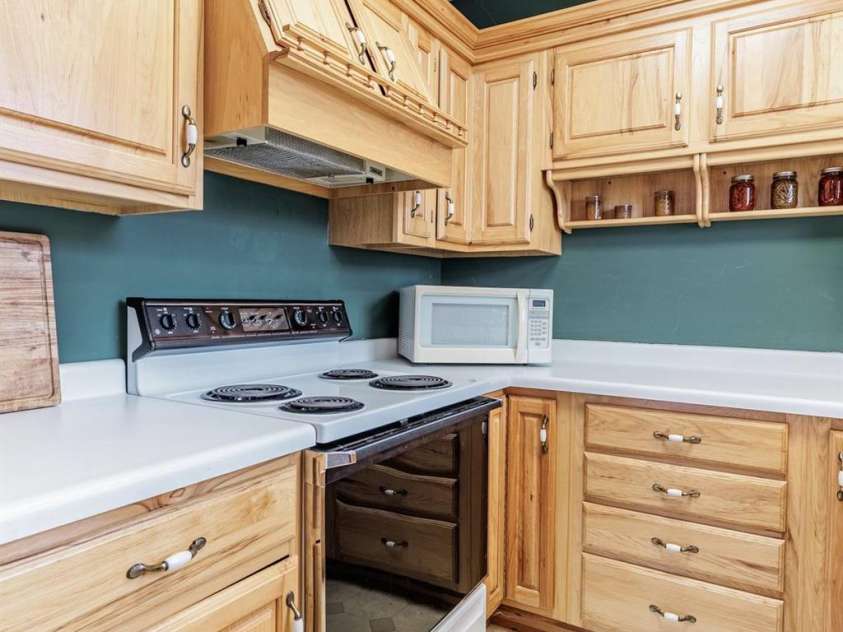 97 Covered Bridge Road, Stecoah, NC 98771.  MLS# CAR4377921, YatesRealty ID 20498. Downstairs Kitchen