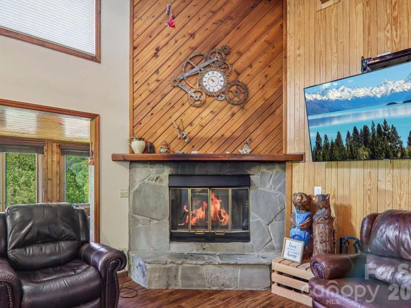 348 Valley Creek Drive, Maggie Valley, NC 28751.  MLS# CAR4372209, YatesRealty ID 20500. Wood Burning stone fireplace