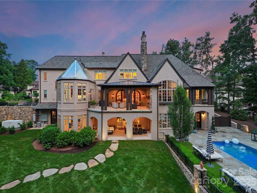 8500 Longview Club Drive, Waxhaw, NC 28173.  MLS# CAR4268585, YatesRealty ID 20500. Expansive backyard offers plenty of space for entertaining.