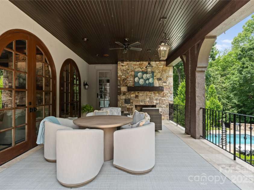 8500 Longview Club Drive, Waxhaw, NC 28173.  MLS# CAR4268585, YatesRealty ID 20500. Main floor terrace off of the great room.