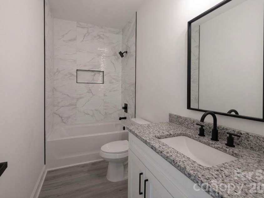 119 Chapel Hill Drive, Troy, NC 27371.  MLS# CAR4347674, YatesRealty ID 20503. Hall Bathroom