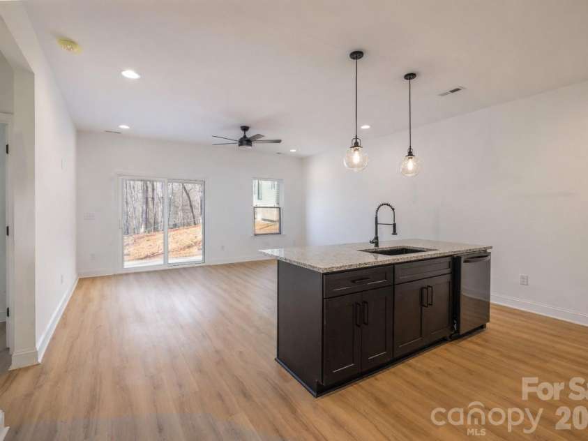 119 Chapel Hill Drive, Troy, NC 27371.  MLS# CAR4347674, YatesRealty ID 20503. Kitchen Living Room Open Floorplan