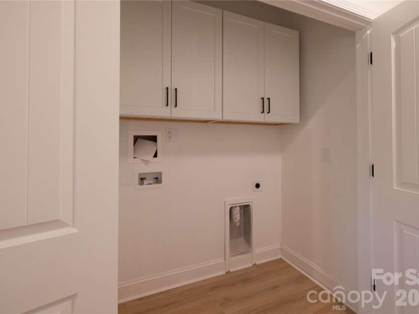 119 Chapel Hill Drive, Troy, NC 27371.  MLS# CAR4347674, YatesRealty ID 20503. Laundry