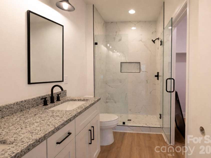 119 Chapel Hill Drive, Troy, NC 27371.  MLS# CAR4347674, YatesRealty ID 20503. Primary Bath