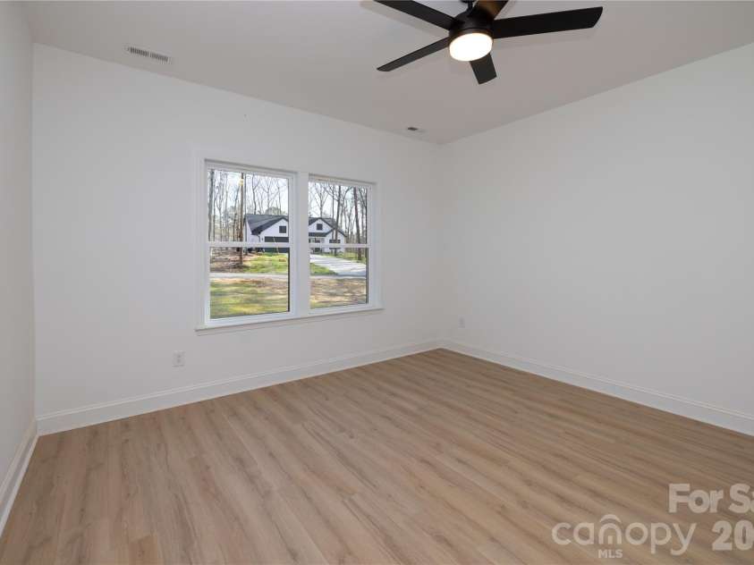 119 Chapel Hill Drive, Troy, NC 27371.  MLS# CAR4347674, YatesRealty ID 20503. Primary Bedroom