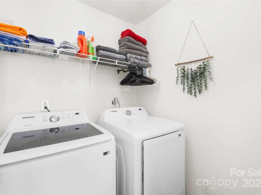 10908 Delsing Court, Charlotte, NC 28214.  MLS# CAR4264464, YatesRealty ID 20504. Good-sized laundry room. Washer and dryer will convey with acceptable Offer.