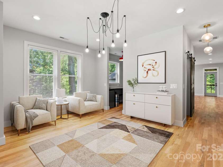 83 Talmadge Street, Asheville, NC 28806.  MLS# CAR4269008, YatesRealty ID 20511. Sitting room entryway virtually staged