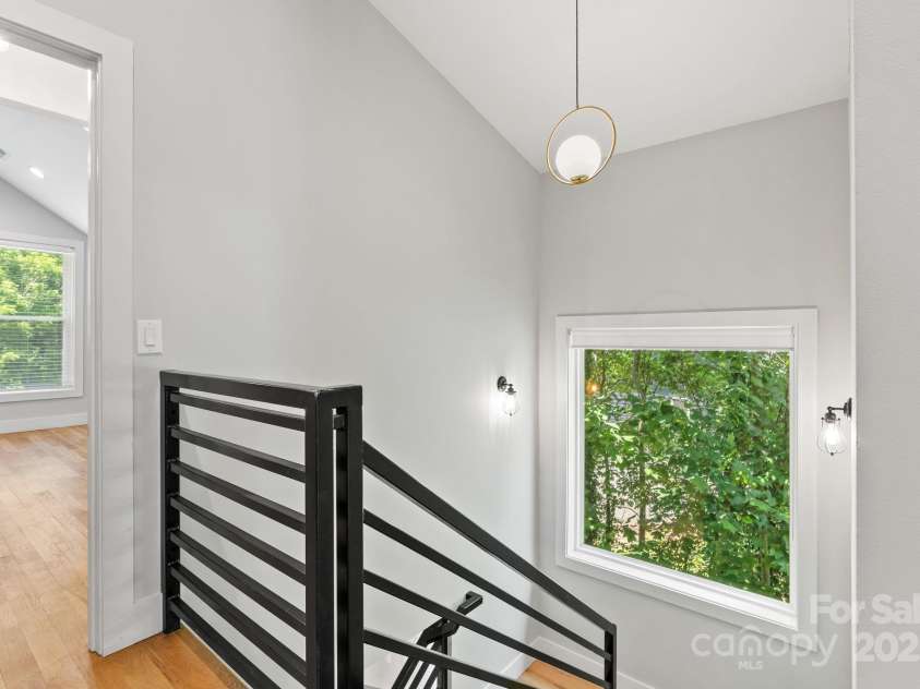 83 Talmadge Street, Asheville, NC 28806.  MLS# CAR4269008, YatesRealty ID 20511. This house feels like it is in the trees!