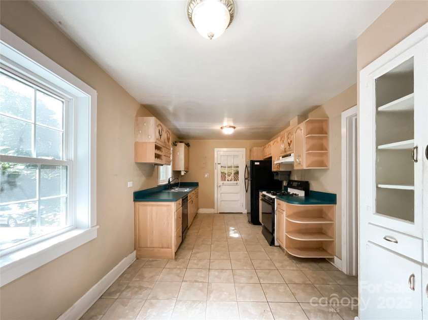 310 Houston Street, Monroe, NC 28112.  MLS# CAR4271975, YatesRealty ID 20515. 