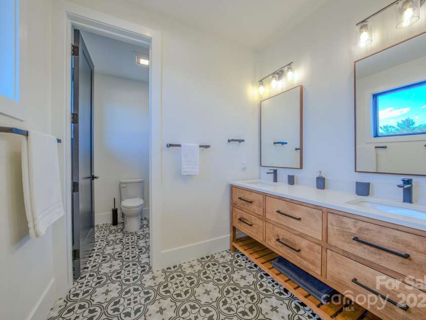 223 Linville View Drive, Nebo, NC 28761.  MLS# CAR4258430, YatesRealty ID 20516. Guest bathroom