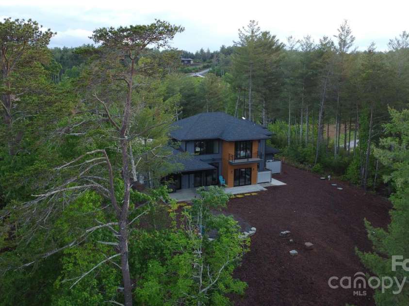 223 Linville View Drive, Nebo, NC 28761.  MLS# CAR4258430, YatesRealty ID 20516. Rear elevation from lake
