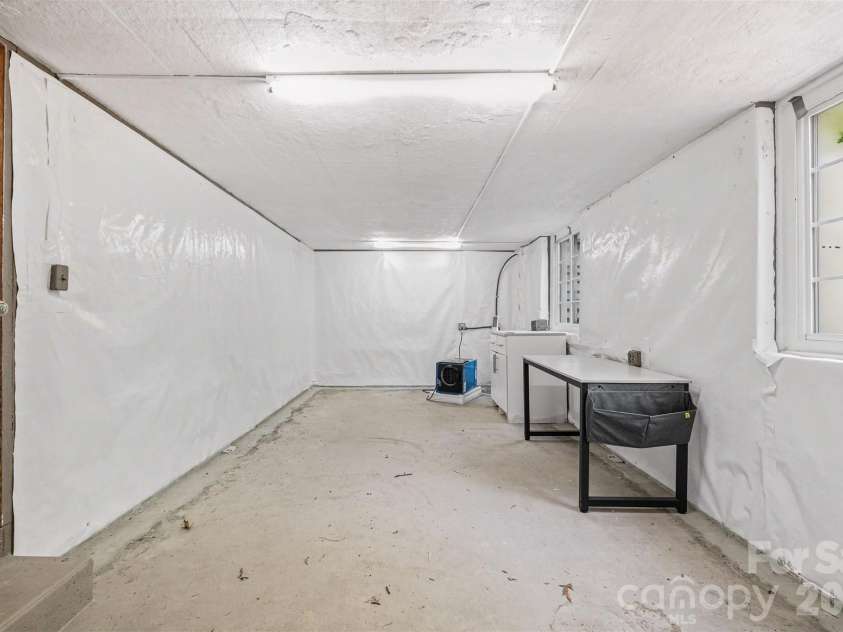 7010 Terrace Drive, Charlotte, NC 28211.  MLS# CAR4358839, YatesRealty ID 20519. Storage room off back patio