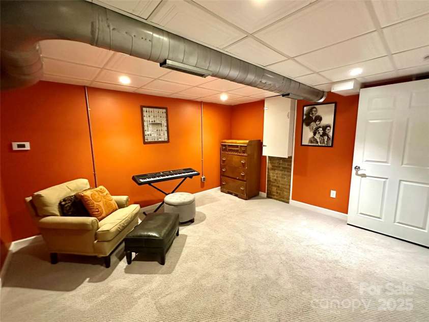 5 Chiles Avenue, Asheville, NC 28803.  MLS# CAR4219140, YatesRealty ID 20523. Basement Bedroom is Comfortable and Bright