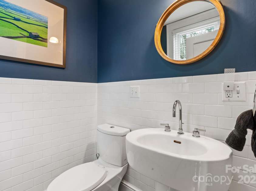 5 Chiles Avenue, Asheville, NC 28803.  MLS# CAR4219140, YatesRealty ID 20523. Contemporary Half Bath on the Main Level