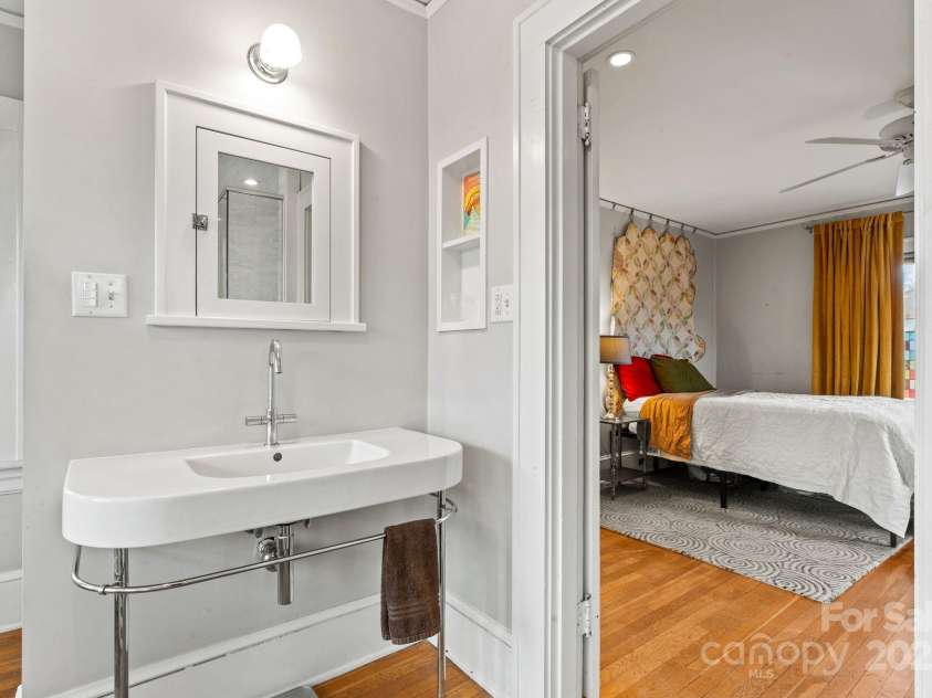 5 Chiles Avenue, Asheville, NC 28803.  MLS# CAR4219140, YatesRealty ID 20523. Retro Styling and Built-in Details Bring This Home to Life