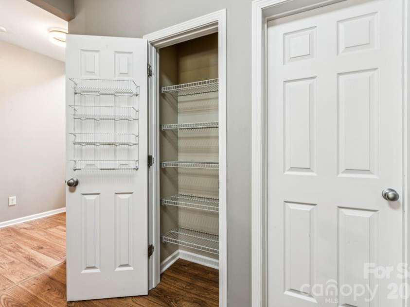 11961 Stratfield Place Circle, Pineville, NC 28134.  MLS# CAR4379455, YatesRealty ID 20527. Pantry in Kitchen