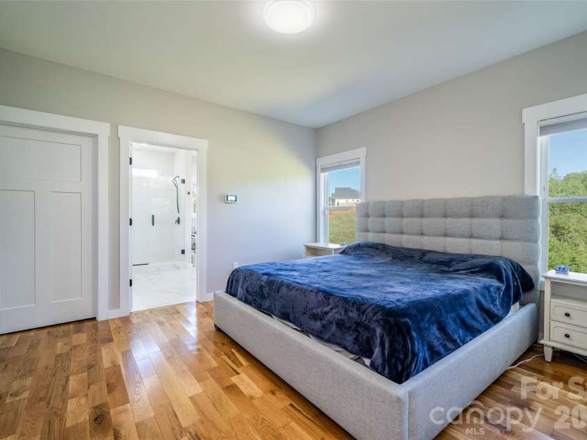 49 Temujin Drive, Leicester, NC 28748.  MLS# CAR4297151, YatesRealty ID 2053. Primary bedroom