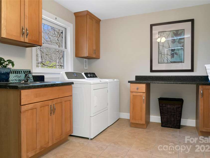 2600 Connestee Trail, Brevard, NC 28712.  MLS# CAR4235647, YatesRealty ID 20535. Laundry room/mud room