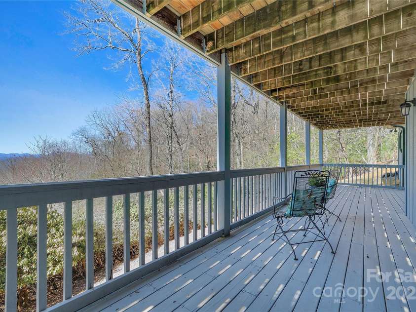 2600 Connestee Trail, Brevard, NC 28712.  MLS# CAR4235647, YatesRealty ID 20535. Lower level deck