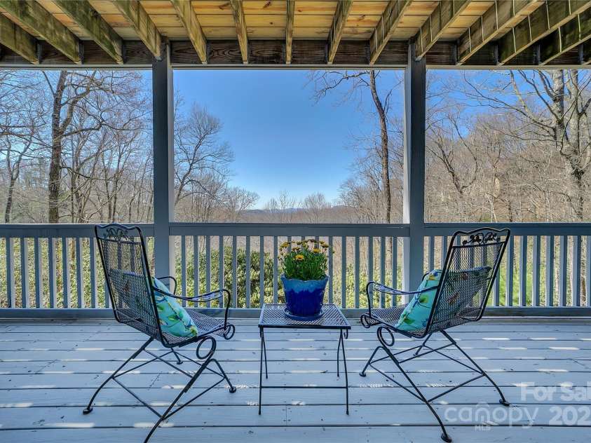 2600 Connestee Trail, Brevard, NC 28712.  MLS# CAR4235647, YatesRealty ID 20535. Lower level deck