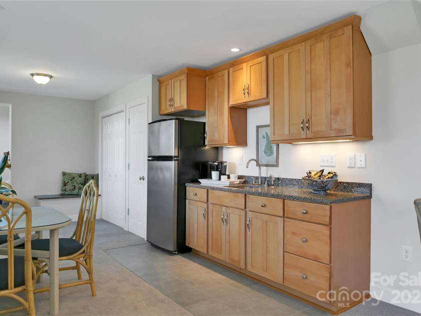 2600 Connestee Trail, Brevard, NC 28712.  MLS# CAR4235647, YatesRealty ID 20535. Lower level kitchenette