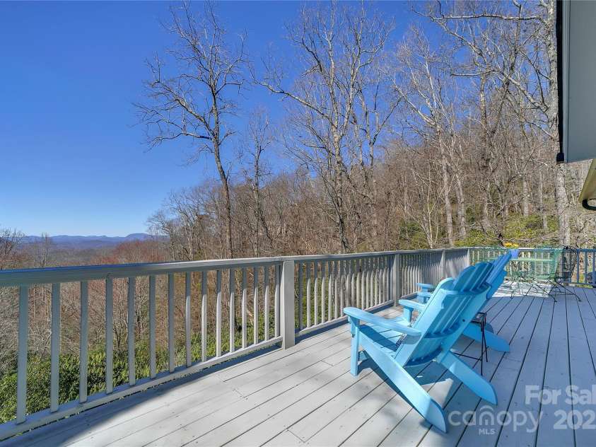 2600 Connestee Trail, Brevard, NC 28712.  MLS# CAR4235647, YatesRealty ID 20535. Main level deck