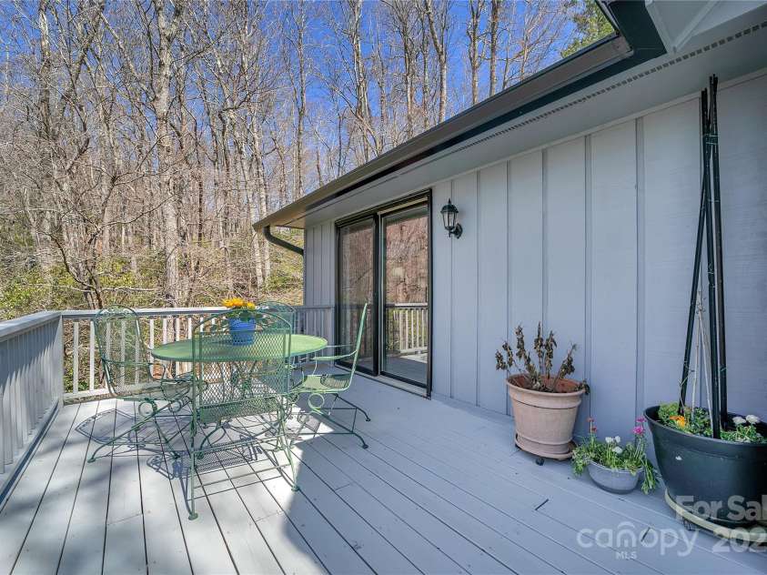2600 Connestee Trail, Brevard, NC 28712.  MLS# CAR4235647, YatesRealty ID 20535. Main Level Deck